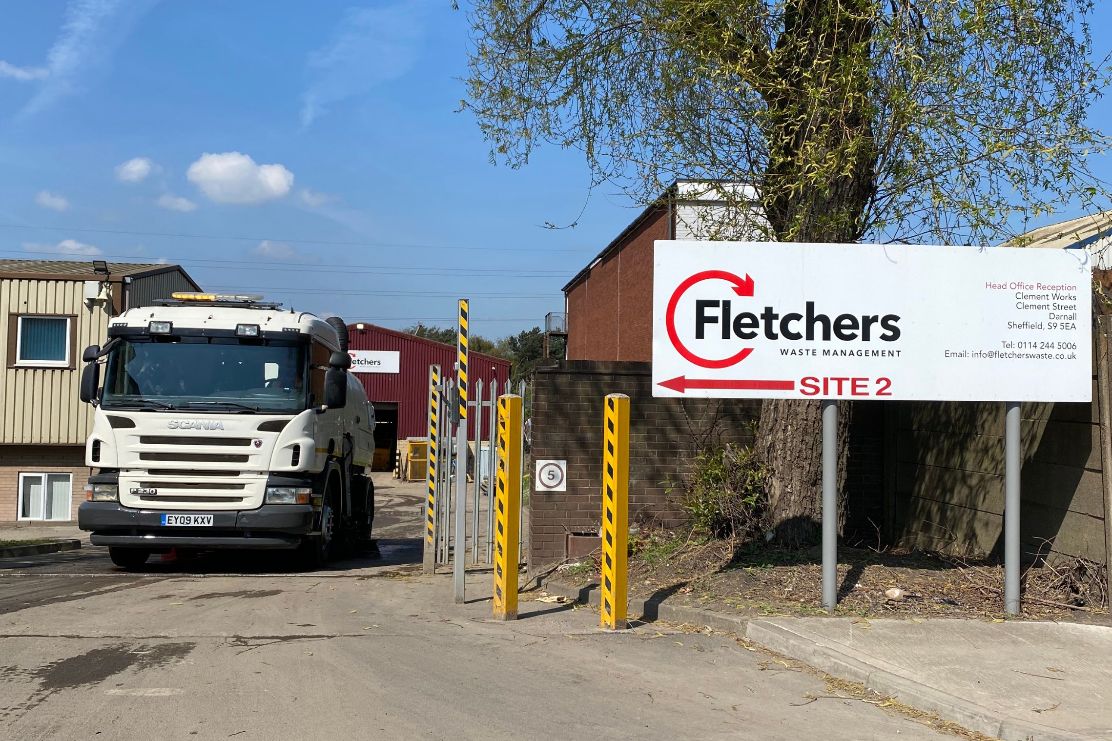 Road Sweeper Approaching Fletchers Waste Sign